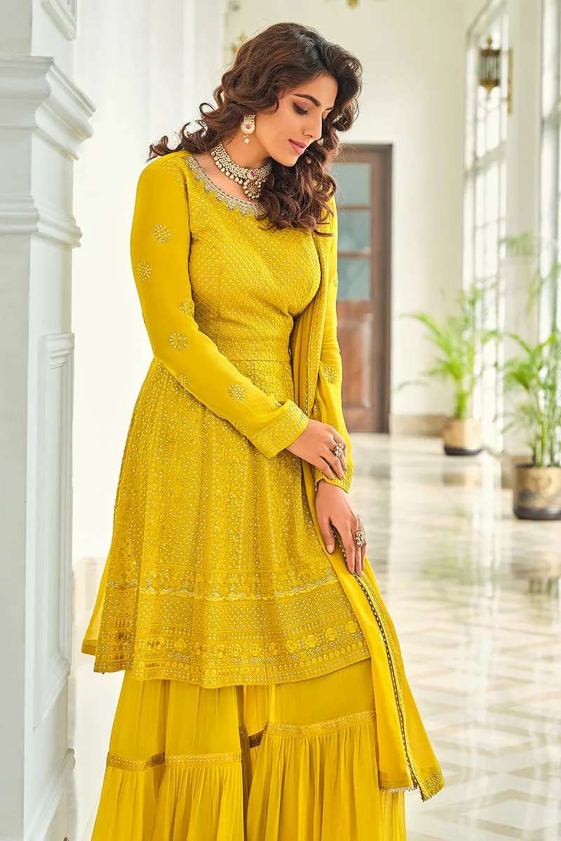 Attractive Yellow Gharara Style Embroidered Peplum Suit