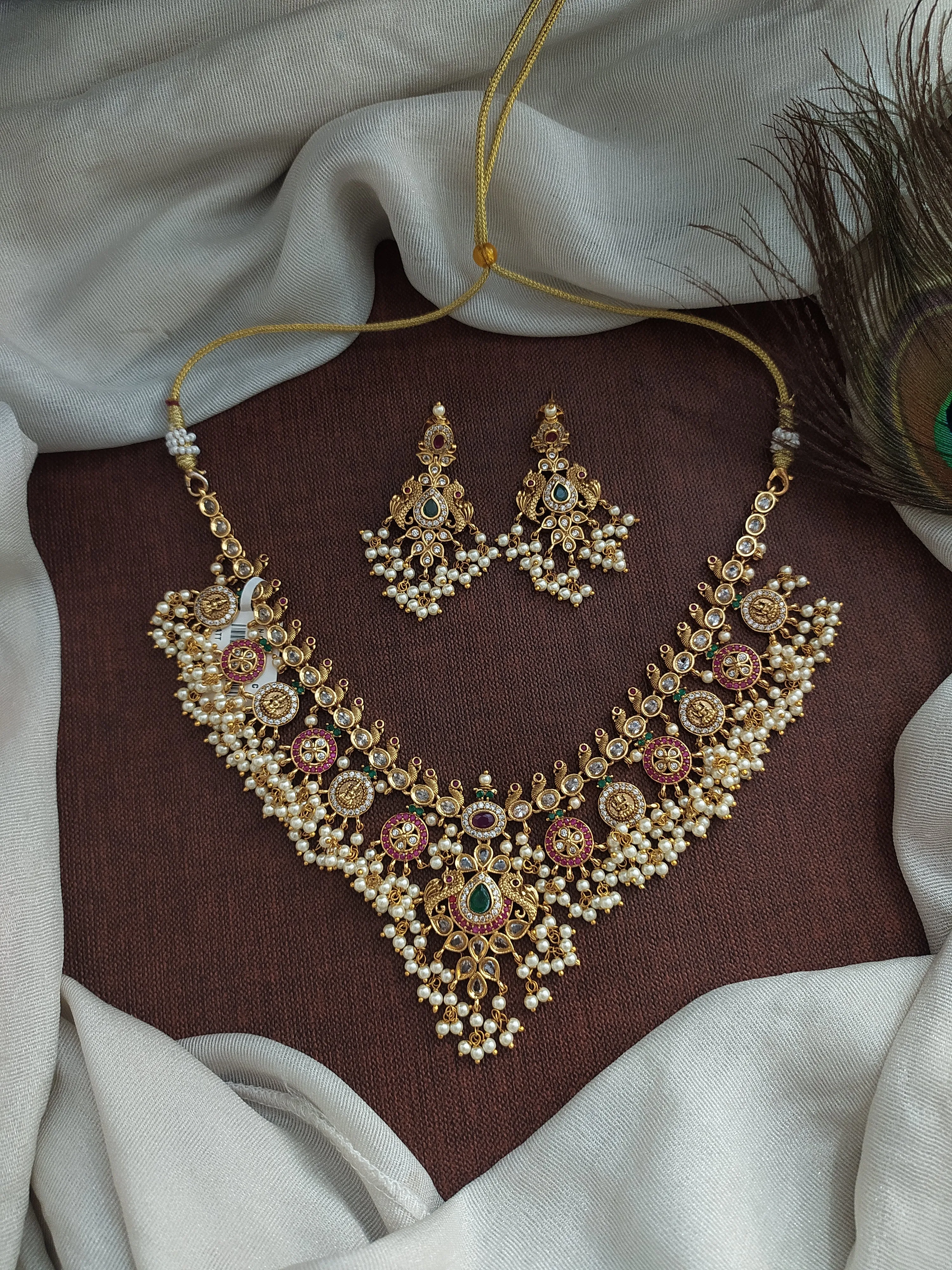 "Antique Guttapusalu Necklace with Peacock and Lakshmi Coin Designs"